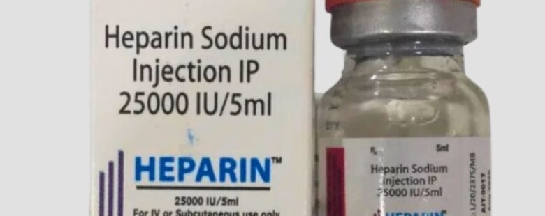 Vial of Heparin Sodium Injection - Anticoagulant medication for preventing blood clots, used in various medical treatments and procedures